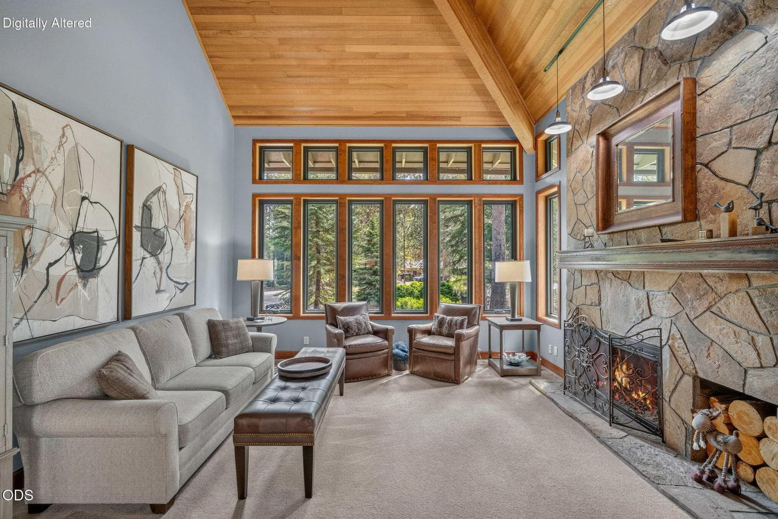 Inviting great room blends rustic textures with modern comfort and gas fireplace.