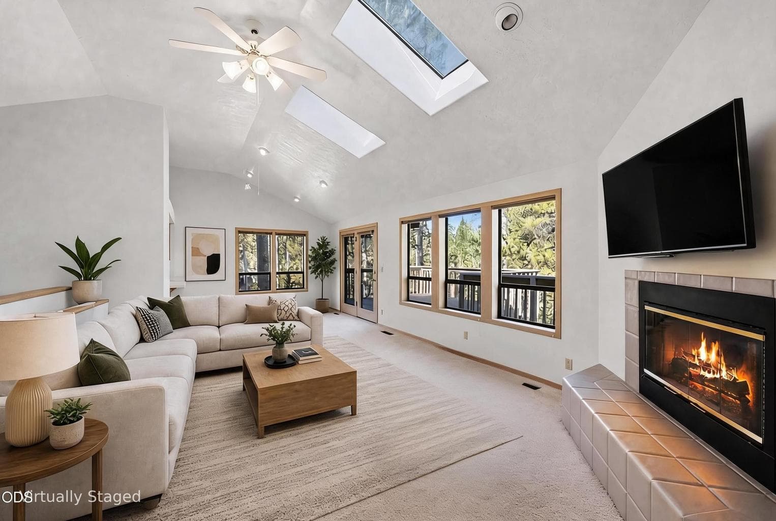 Natural gas fireplace in your 1st living room area to gather & discuss your day's adventures! Your French doors and more skylights & custom cabinetry/built-ins. Half-bath around the corner so the 1st primary ensuite upstairs w/French door access to the deck is private. Virtual staging - Living Room Set up 1, different angle