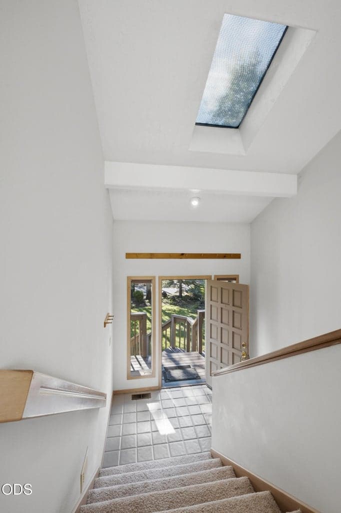 View from upstairs to split-level entry.