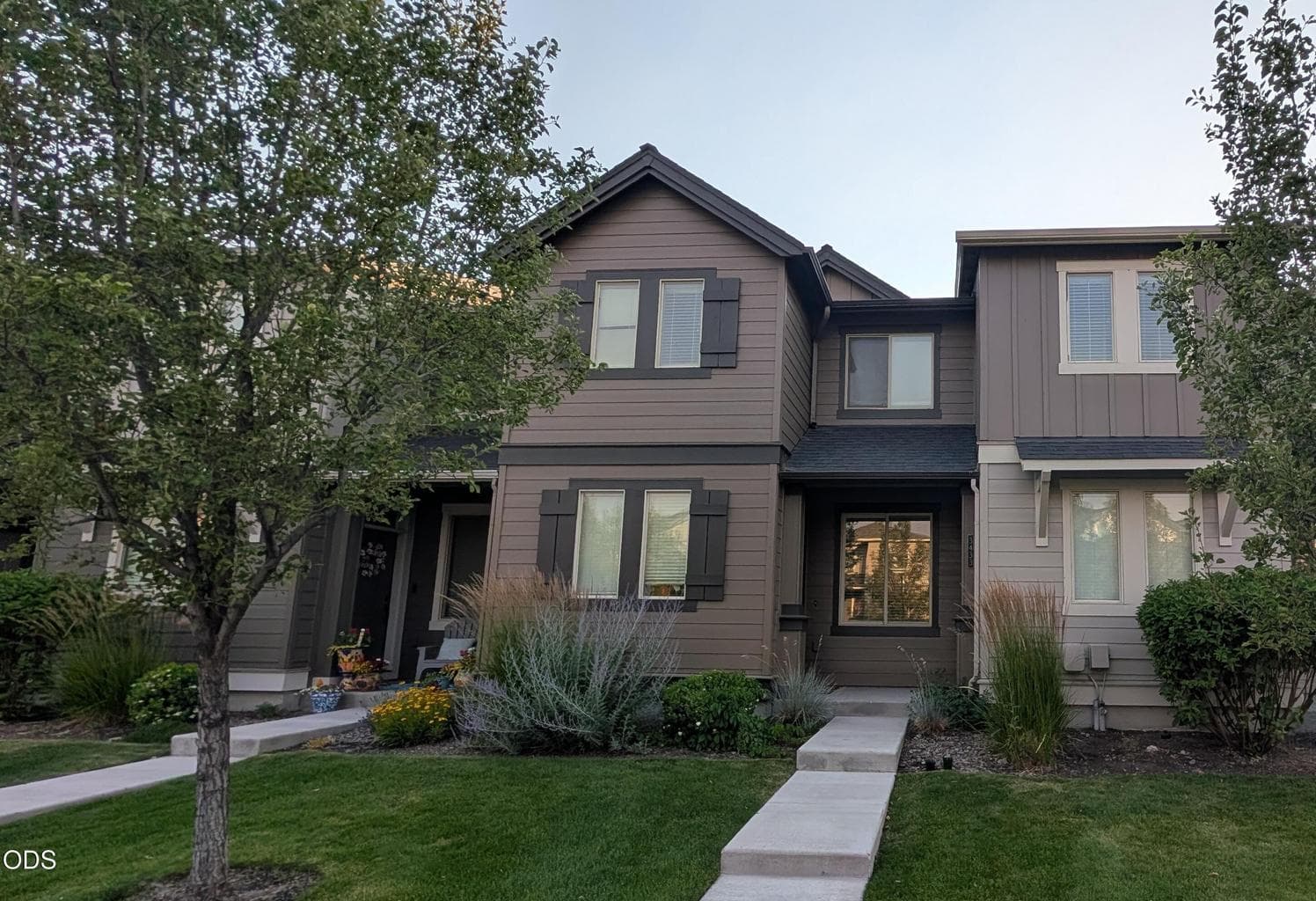 Darker unit with pitched roof and covered front porch