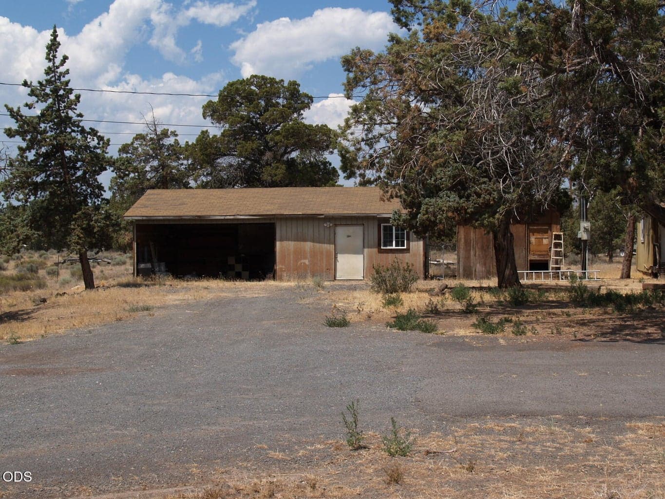 Workshop and parking area just south of home.
