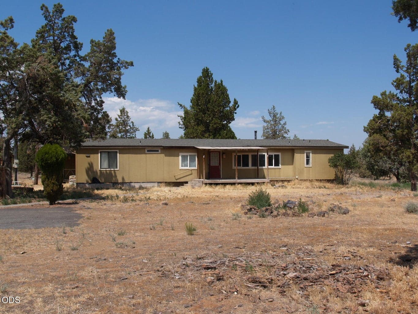 Looking at house from SW Canal Blvd.