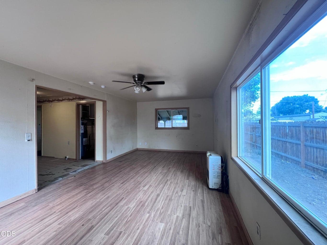 Enter into the deep living area with lots of natural light flooding in