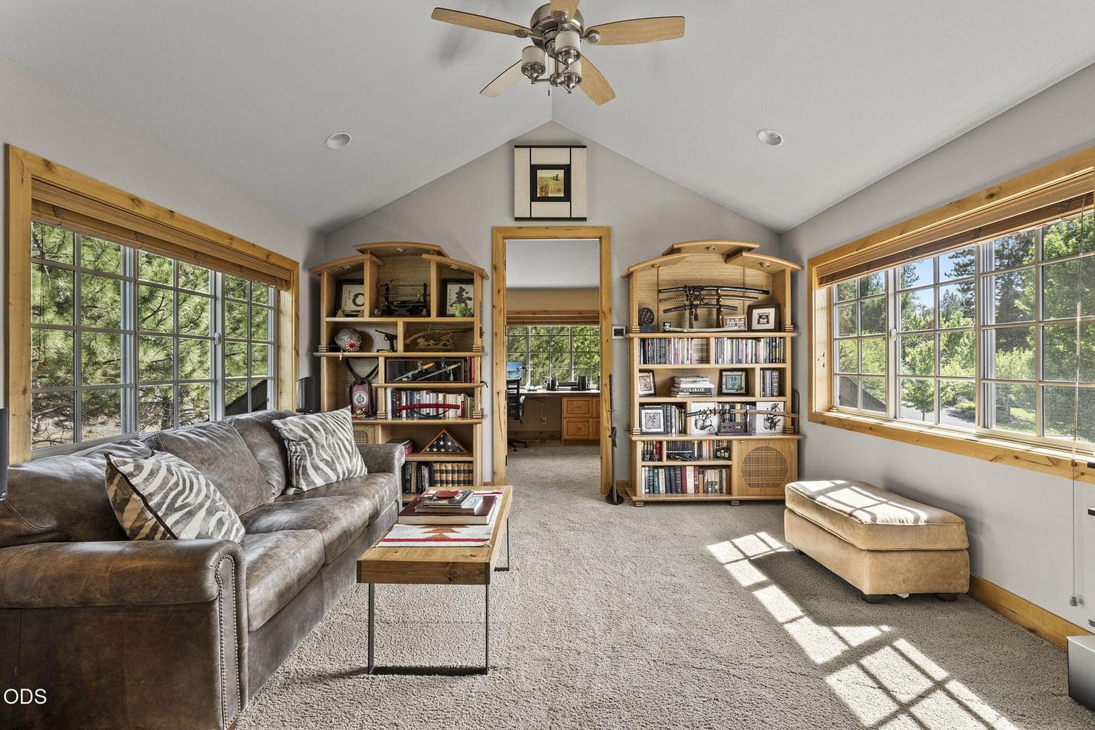 Accessed from within the home is the bonus room with zone temperature controls.