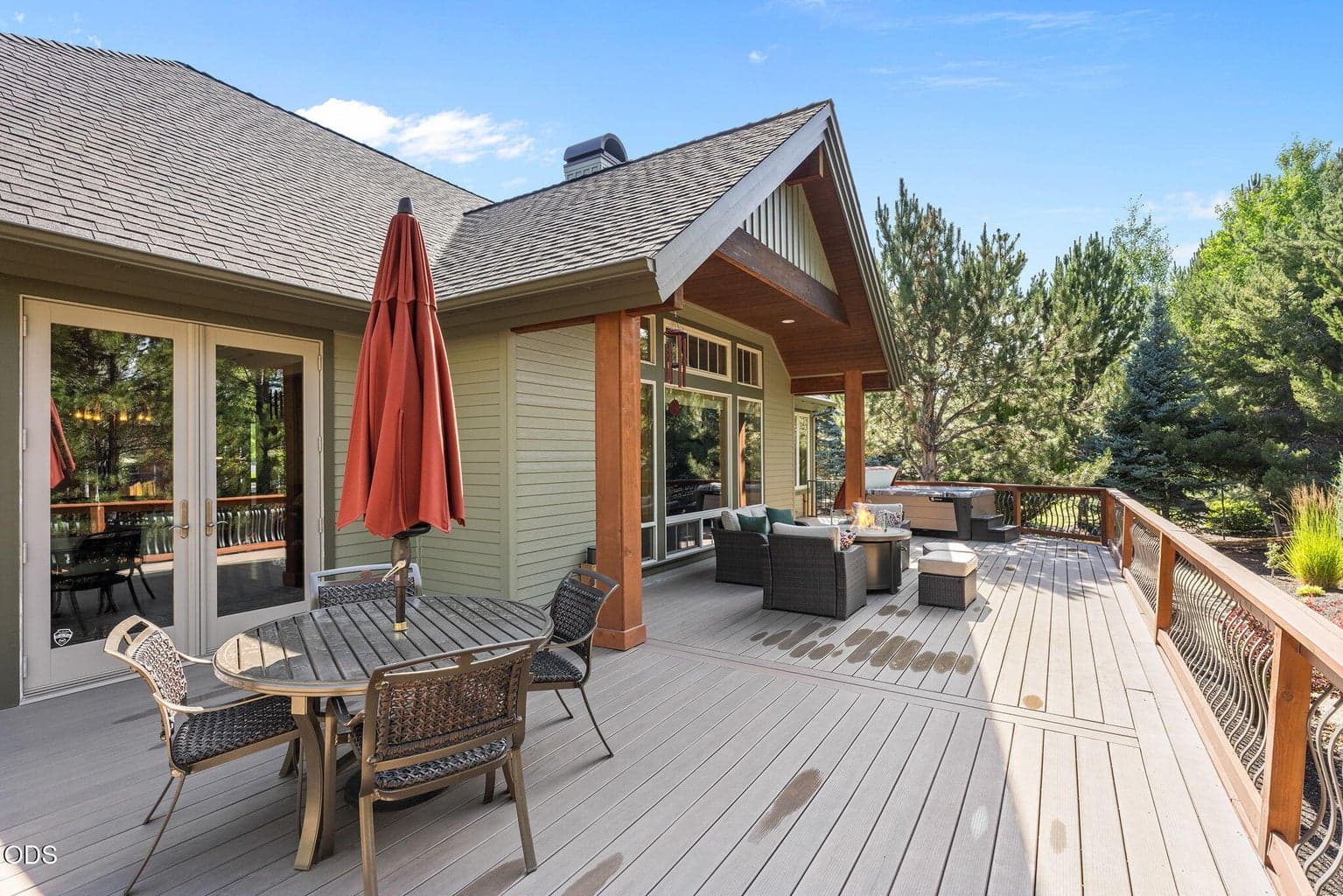 Deck railing and spindles were replaced and updated with cedar railing and metal spindles.