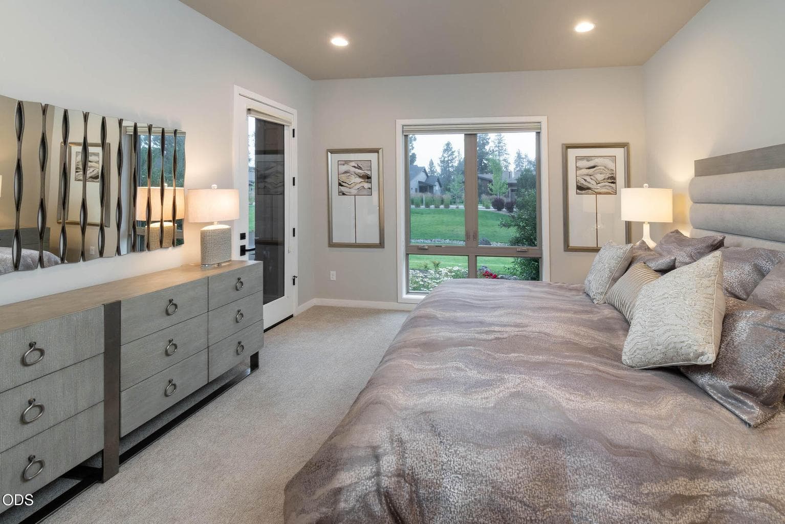 Primary bedroom has private access to patio