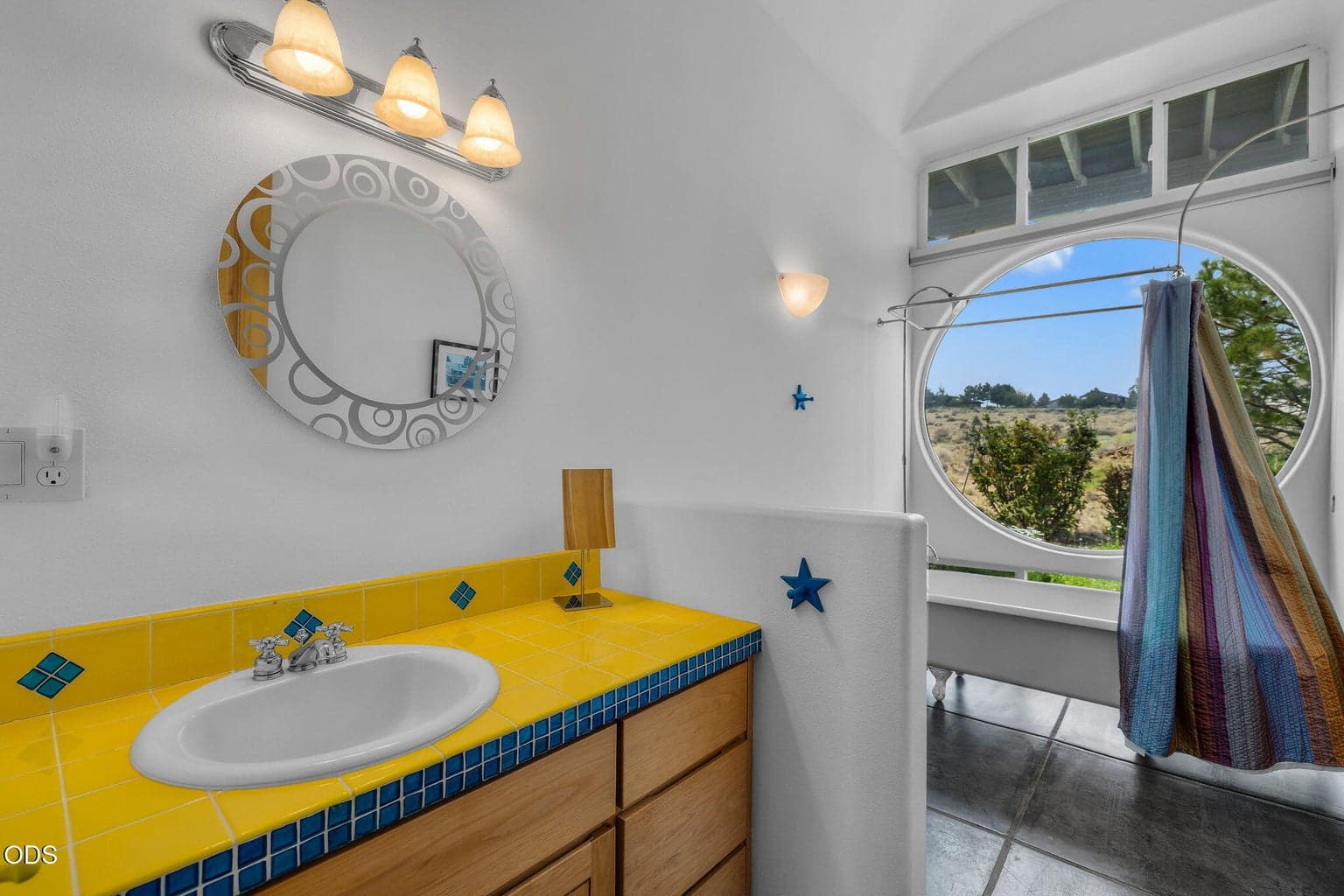 Main bathroom with claw foot tub and shower
