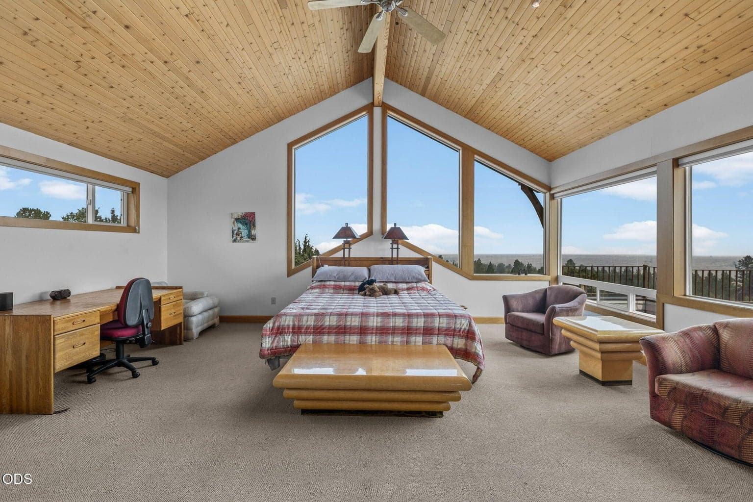 Beautiful Primary suite with walls of windows and mountain views