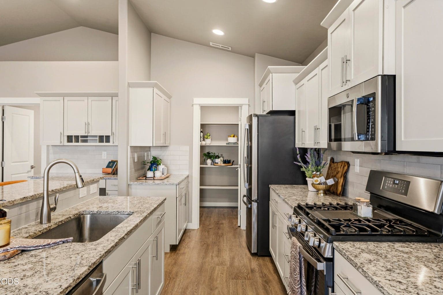 Attractive kitchen with granite counter tops