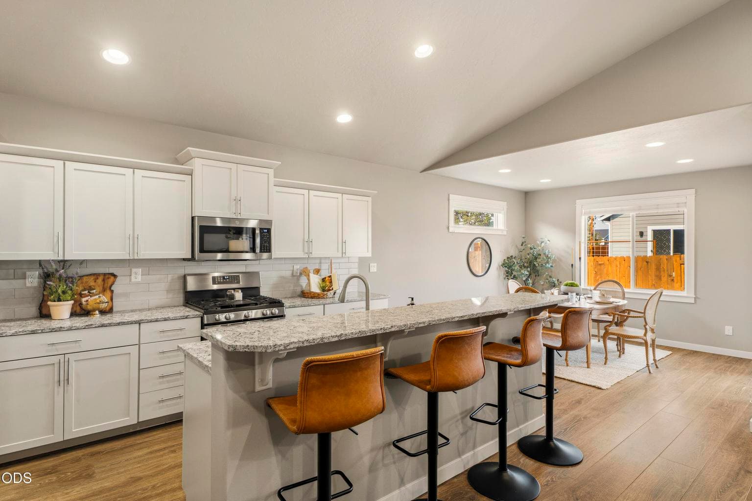 Open kitchen with bar seating
