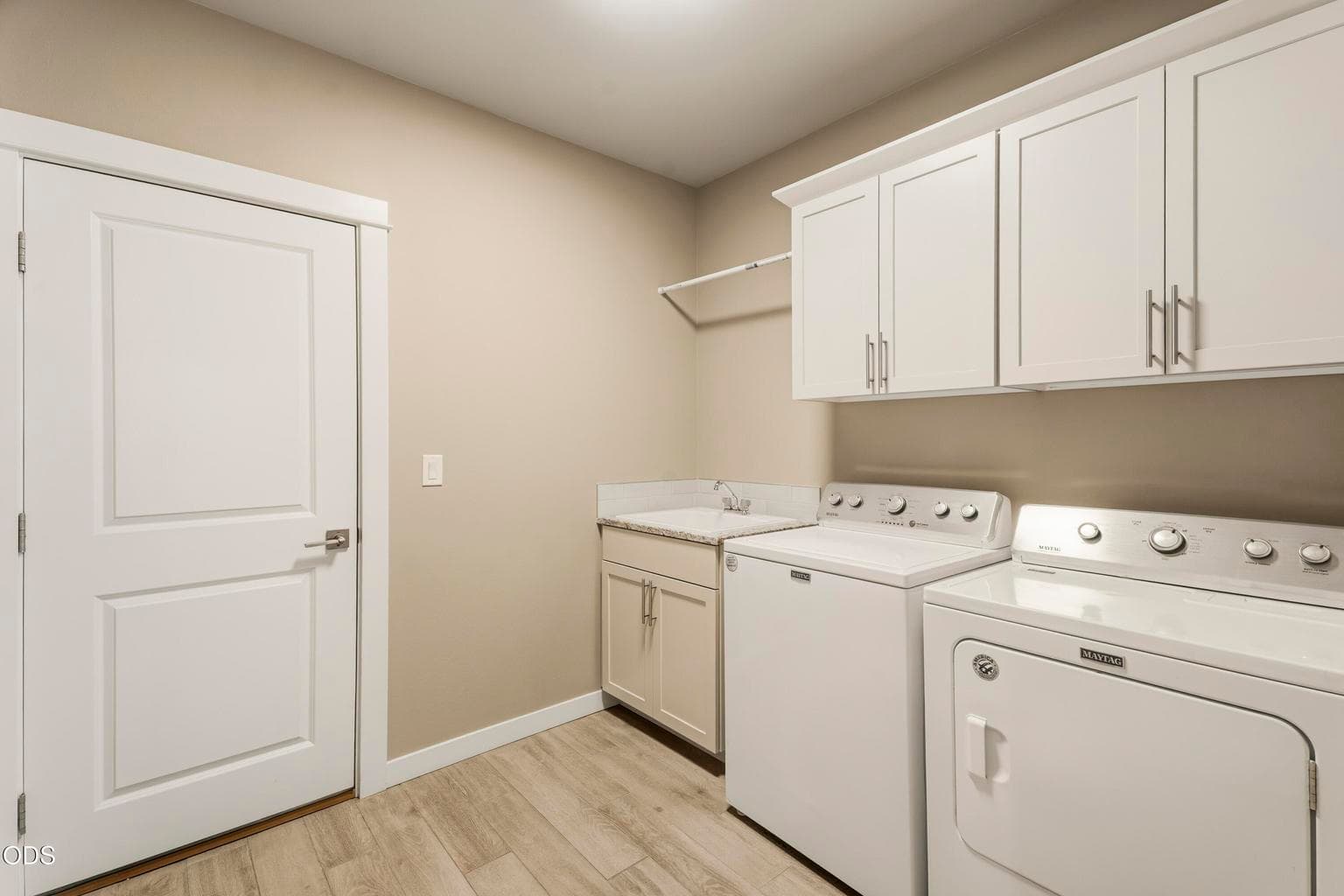 Large laundry room with sink