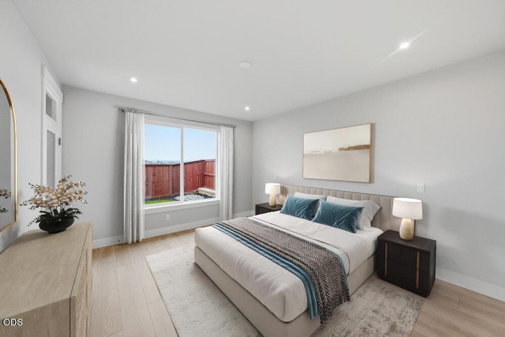 Subject property with virtual staging. Primary suite with LVP flooring & patio door upgrades.
