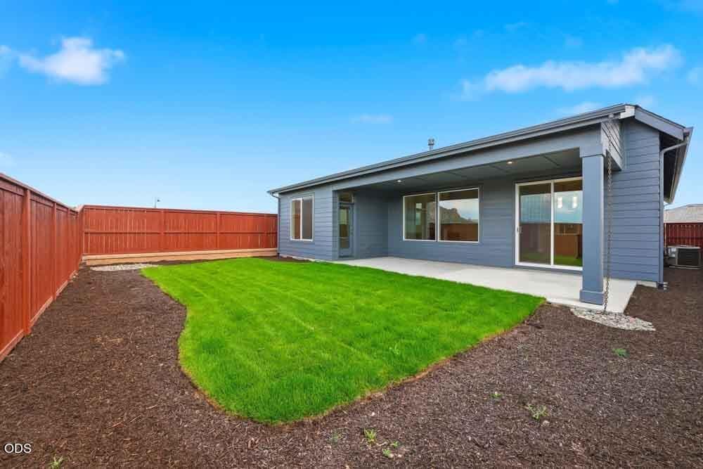 Subject property with upgraded rear yard landscaping and irrigation system included. Beautiful views of Barnes Butte. Backs to public land.