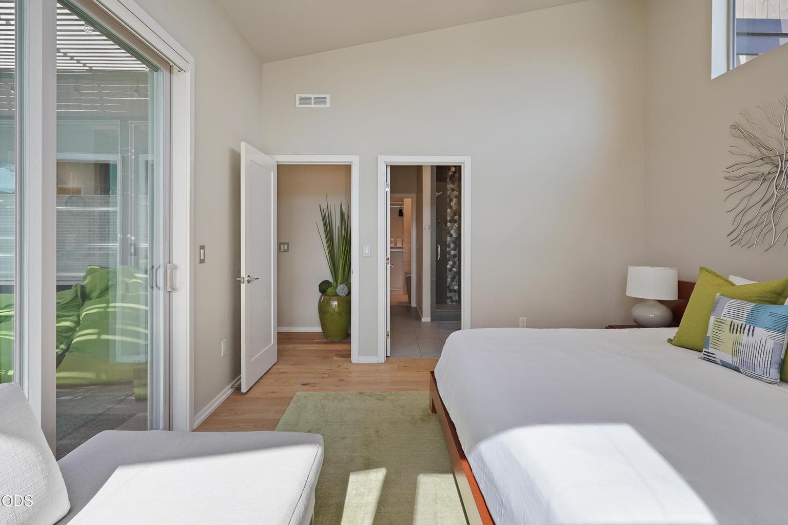 Primary bedroom suite with courtyard access
