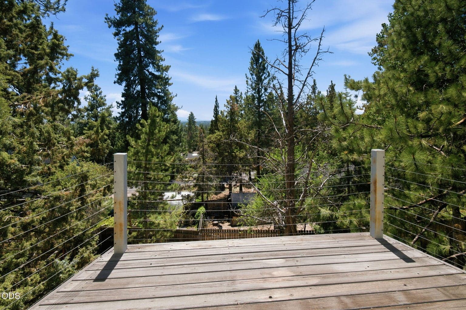 Deck towers above the back...yard