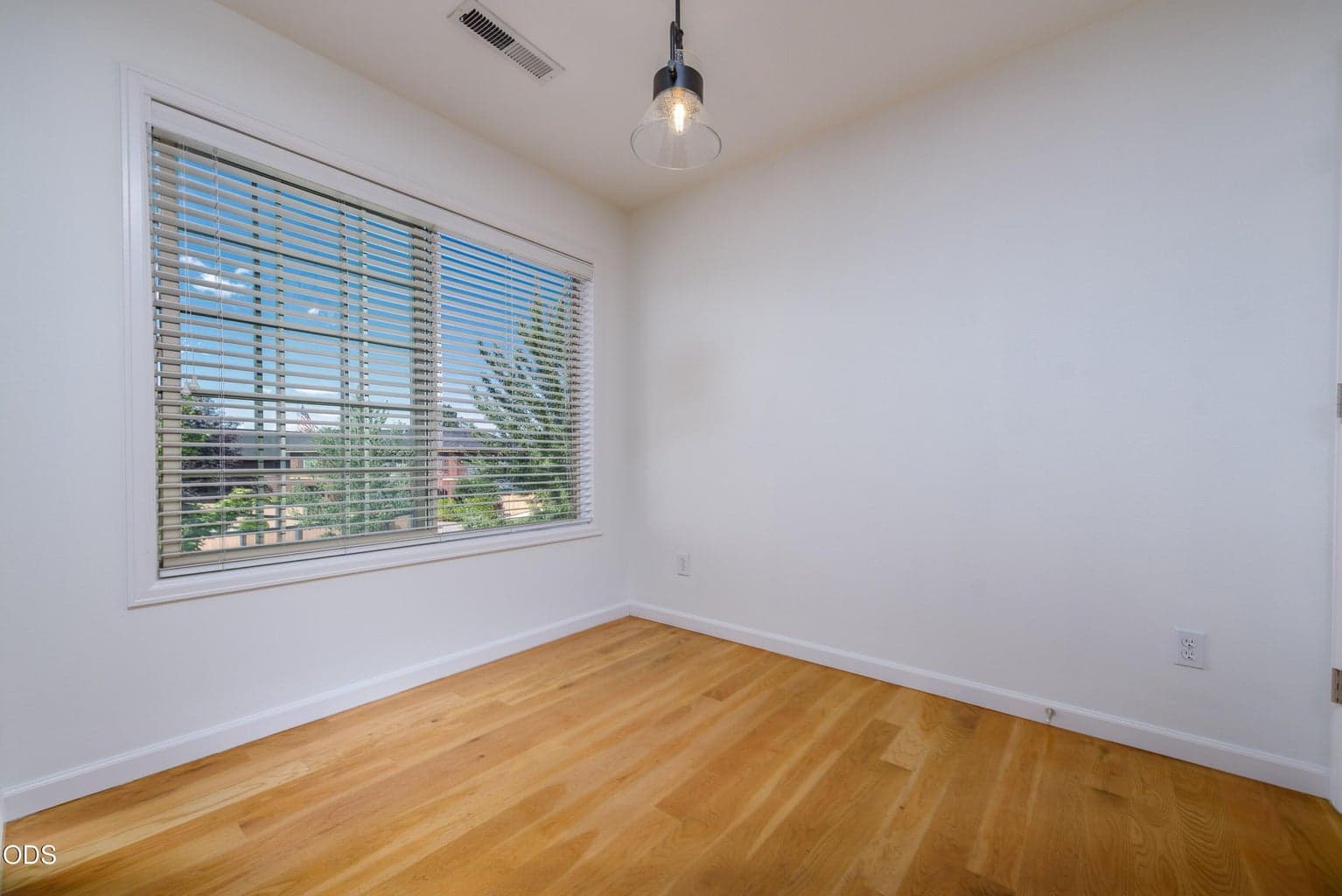 Dining area with a big picture window.