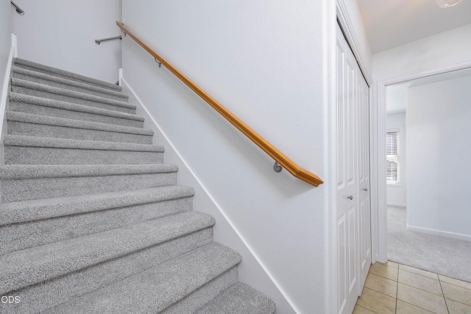 Stairs up to the main living area and second ensuite bedroom. Brand new carpet on the stairs and both bedrooms.