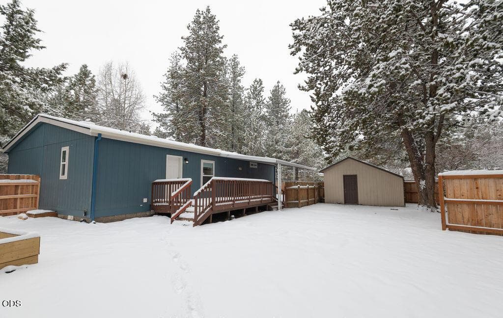 Backyard of main house with storage shed
