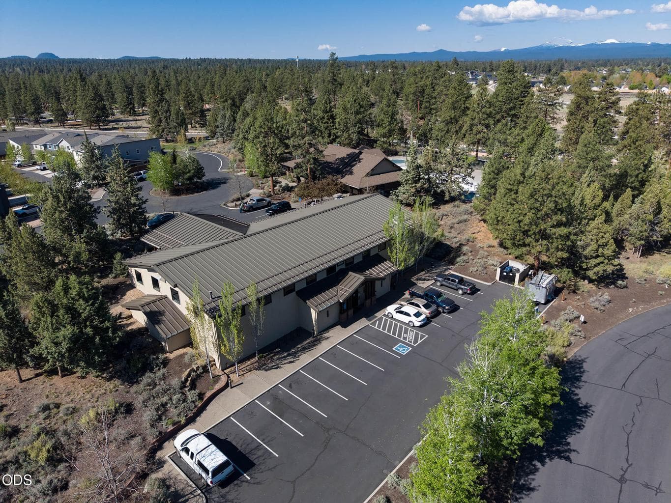 This beautiful treed neighborhood has a lovey topography with rock outcroppings and grassy areas.