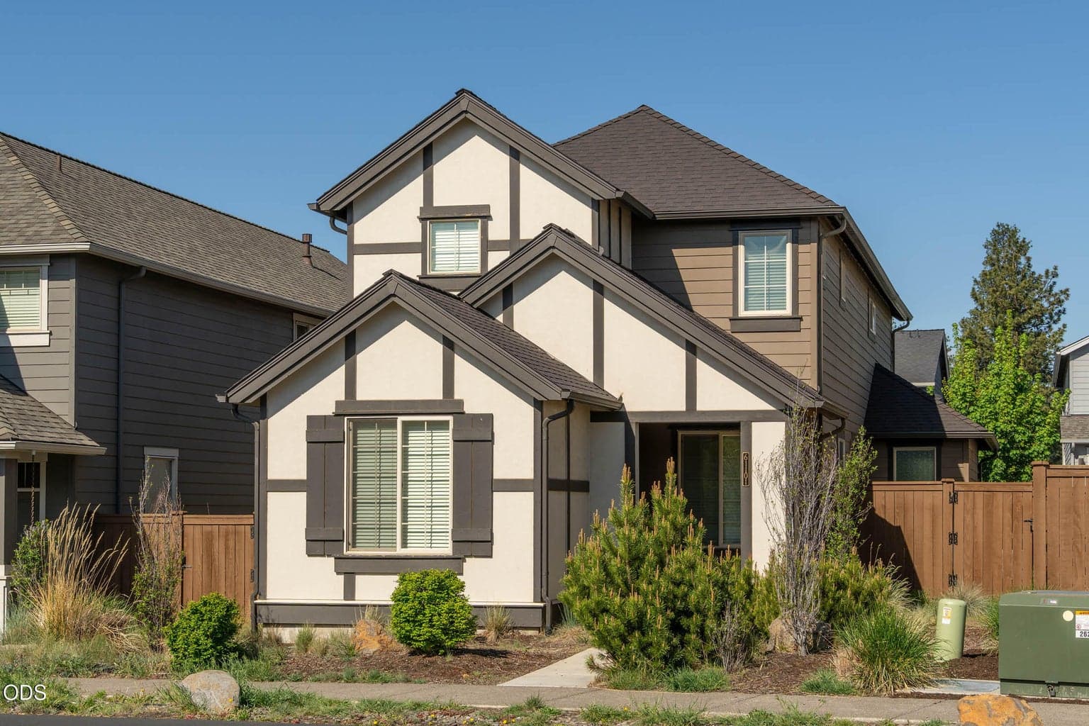 Home boasts convenient covered front entryway and welcoming sidewalk.