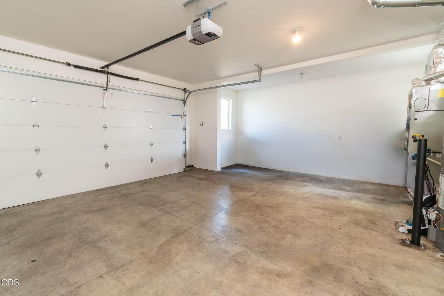 The large double garage also has an extra section for a workshop area on one side including windows for natural light. This feature makes the garage very spacious and pleasant. The garage is finished, includes an insulated door with opener. This home is served by quality gas water heater, furnace, and central air.
