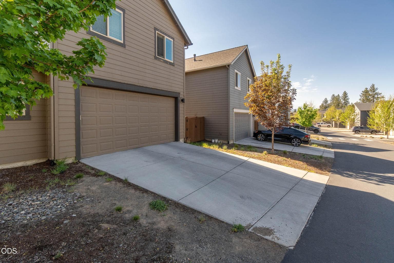 Alley entry into double+ garage, extra parking just outside the garage door is ample.