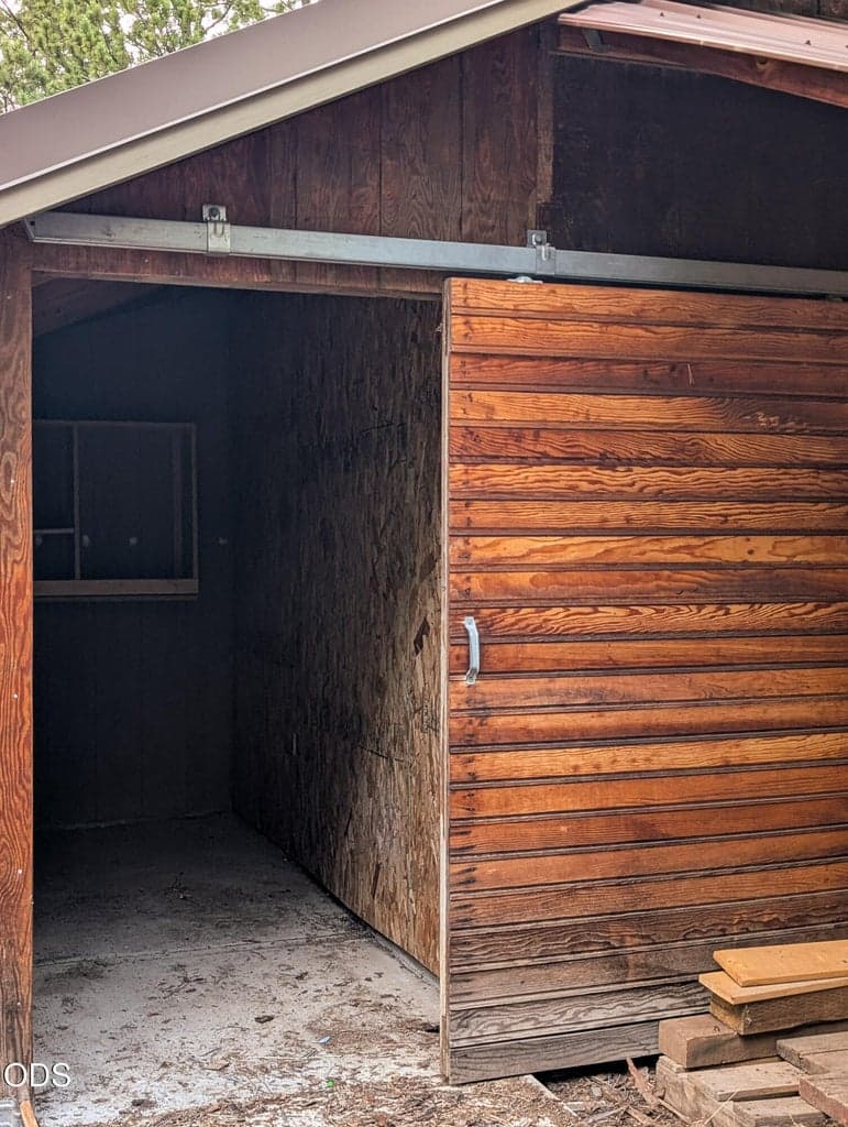 Additional exterior storage area attached to the shop, ideal for equipment, tools, or seasonal items.