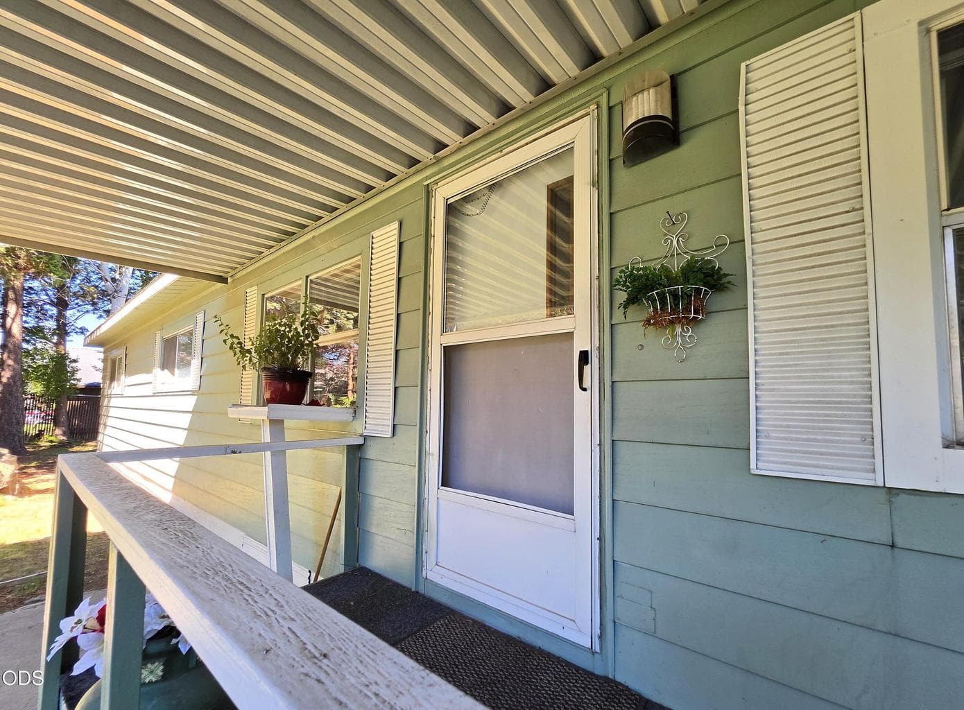 Covered front patio and front door
