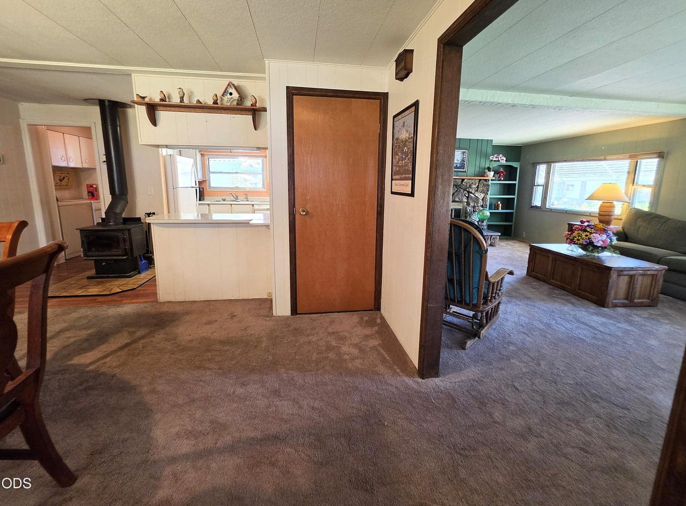 Inside front door with dining to the left and living room to the right