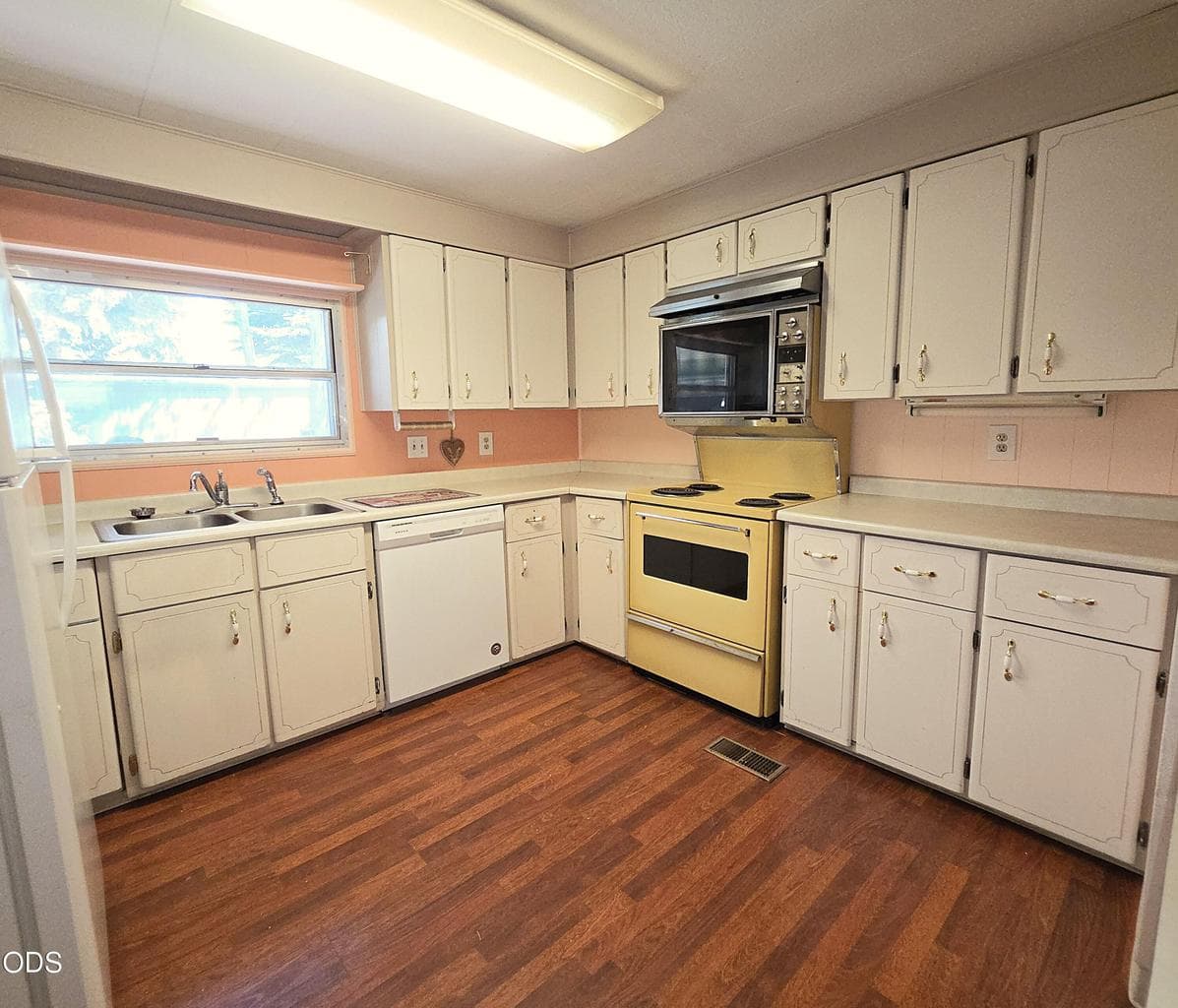 Kitchen has abundant cabinets