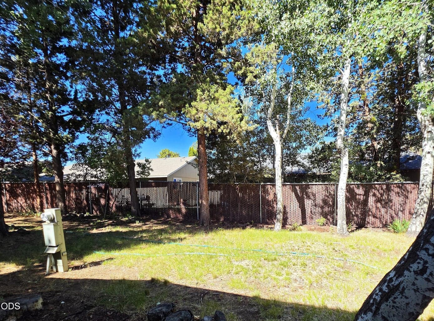Backyard is partially fenced