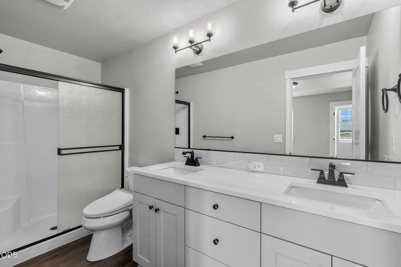Primary Bathroom has walk in shower and double vanity