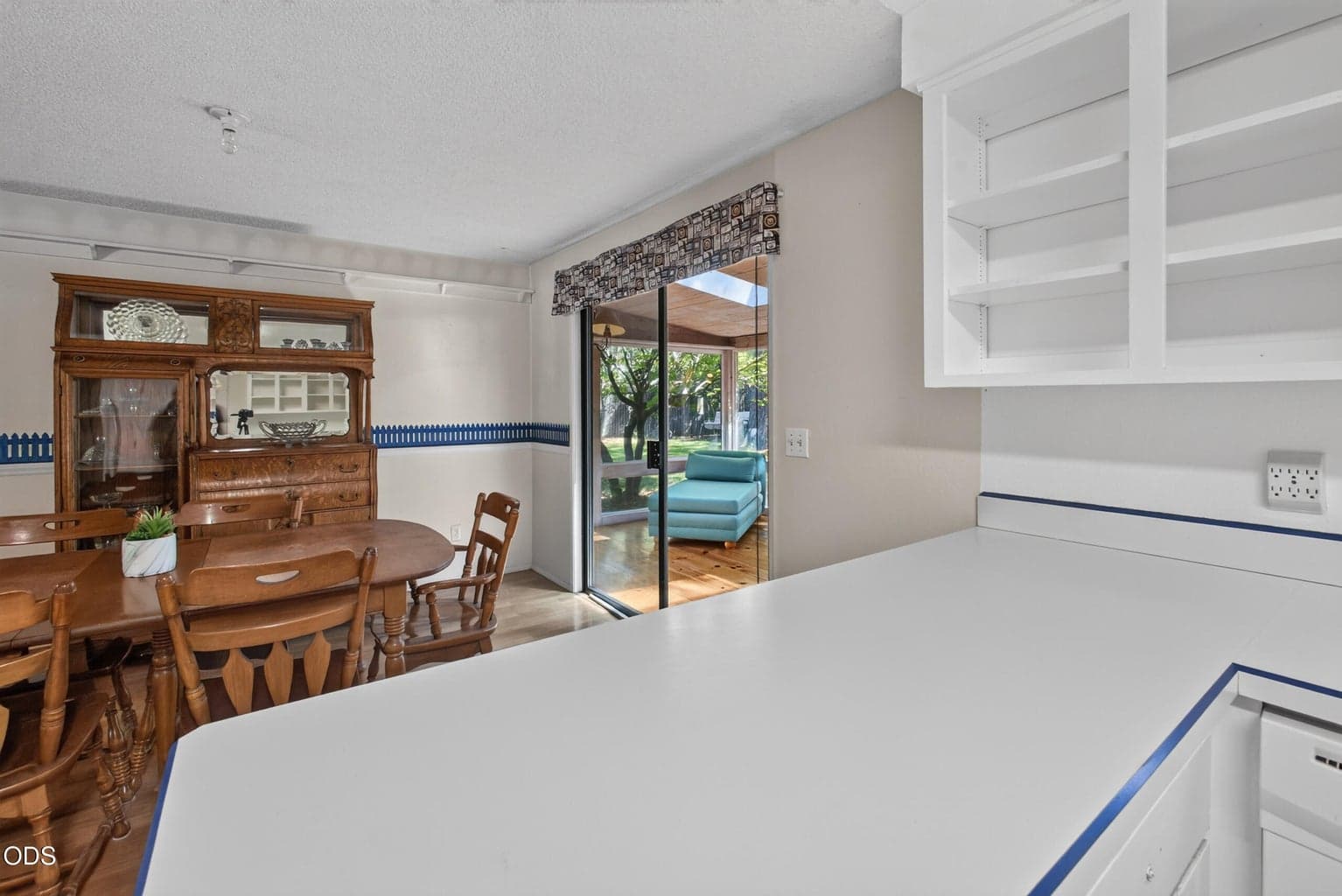 Looking from the kitchen into the sunroom
