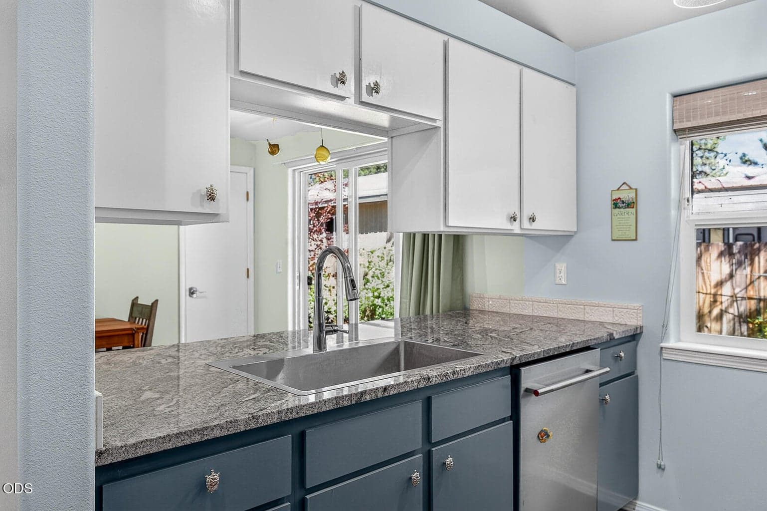 Solid granite counters with large farm sink