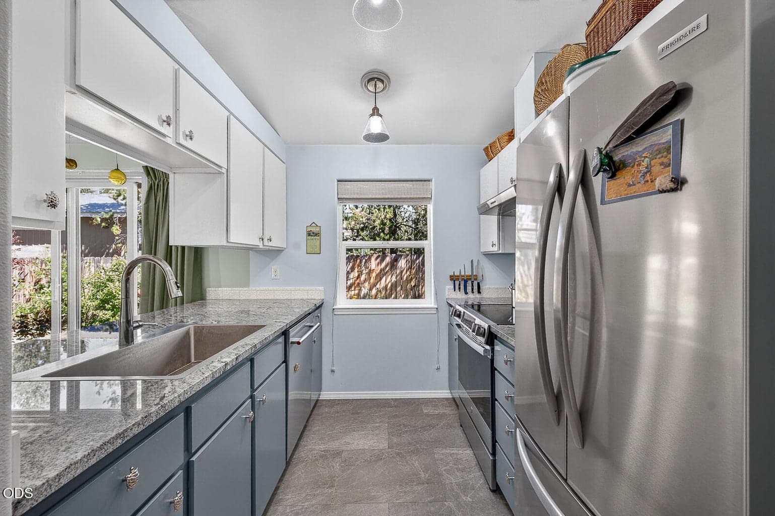 Remodeled kitchen with all new stainless steel appliances and tile flooring
