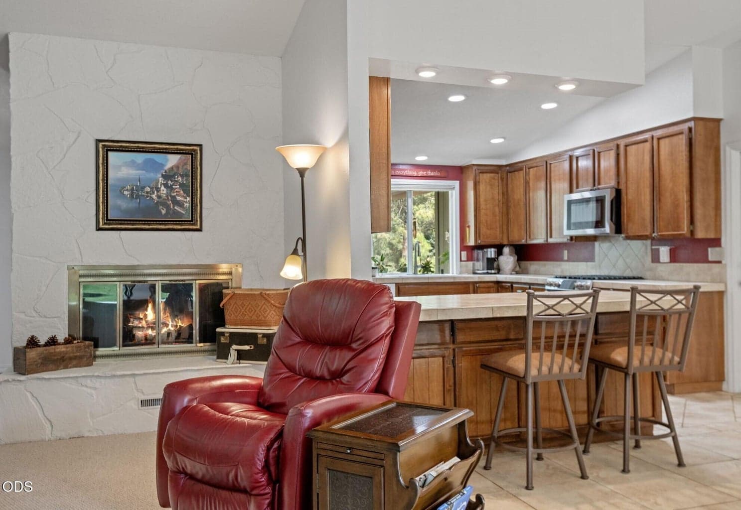 Cozy wood burning fireplace in great room