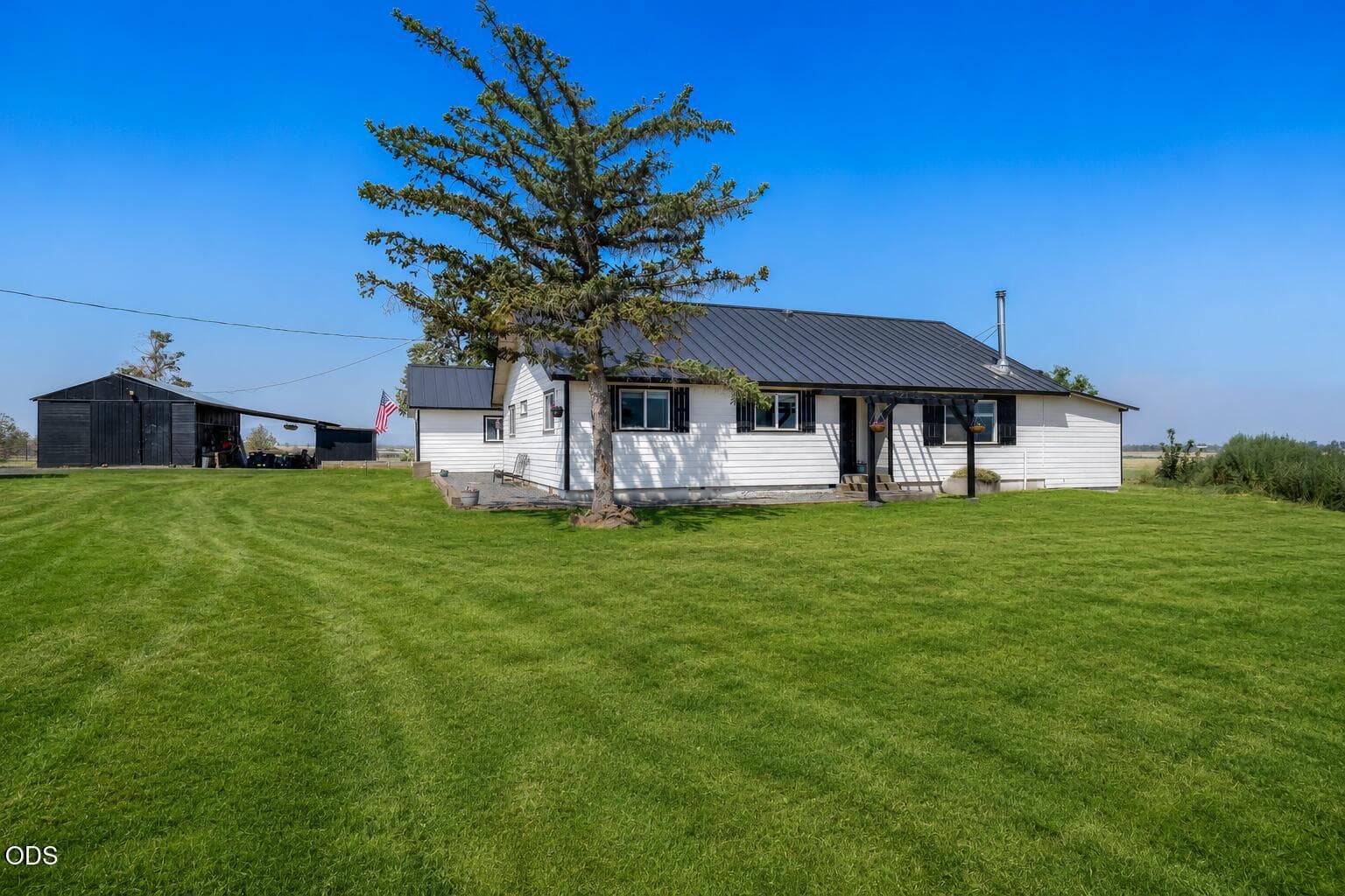 Front view of home with AI enhanced lawn.