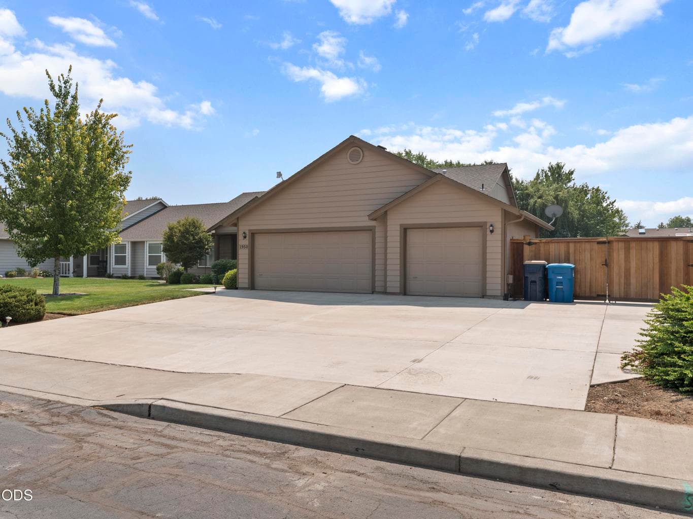 Large concrete pad for parking and RV gate to RV parking