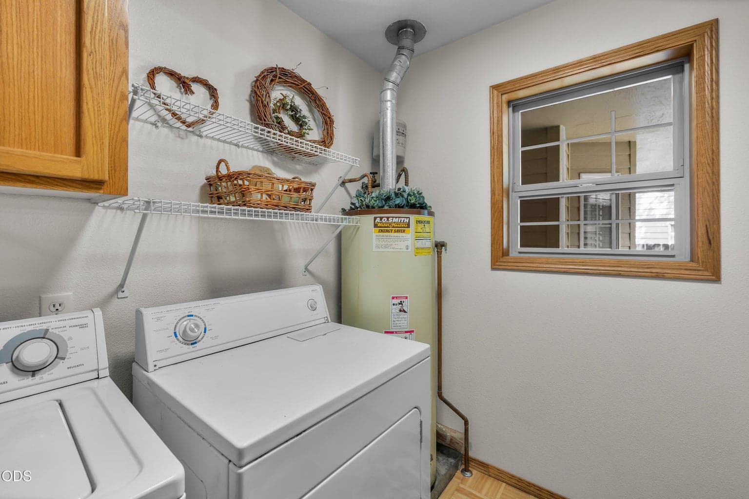 Hot water heater tank in photo replaced with new 2026 tank.