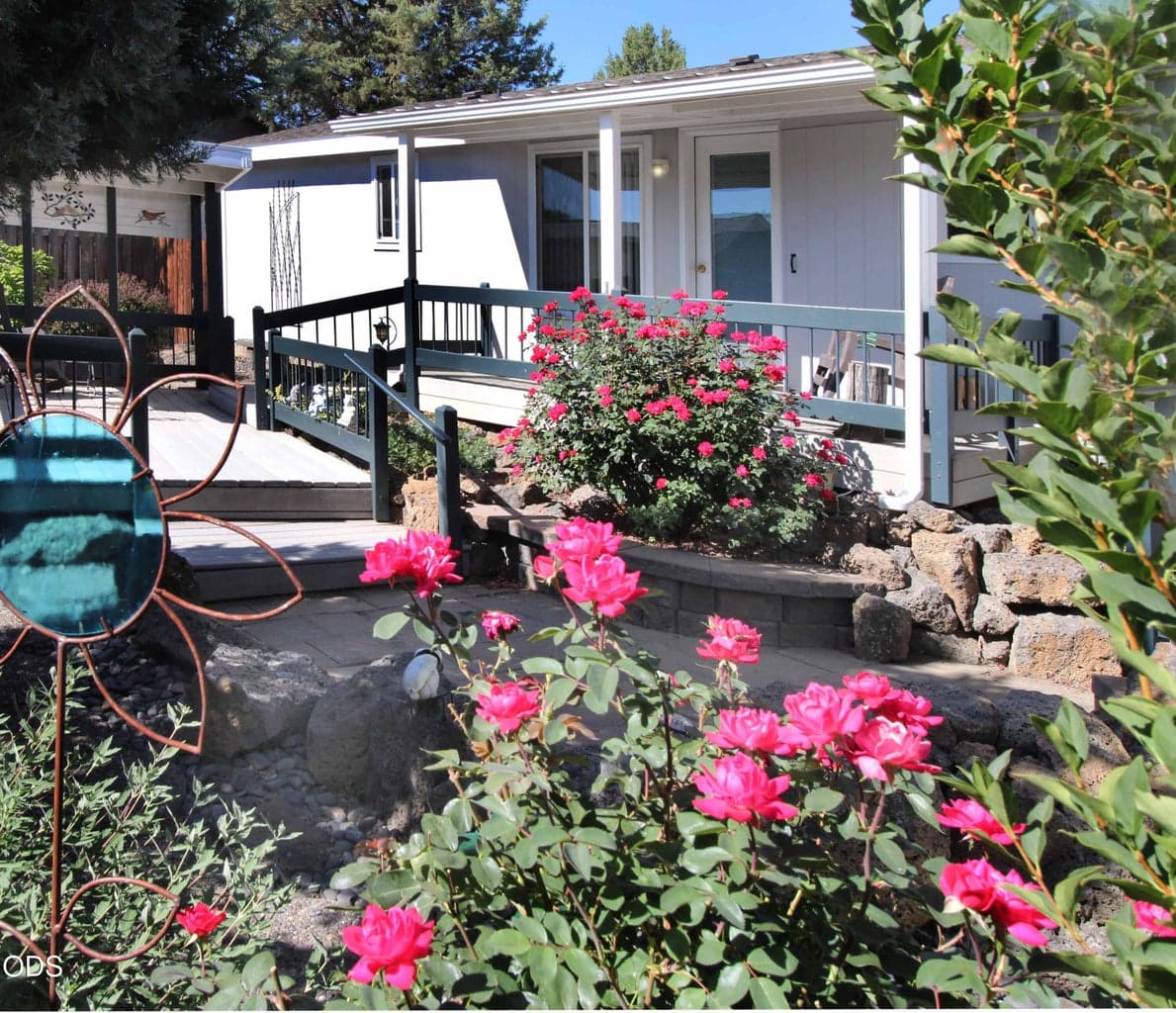 Covered deck; open deck, covered porch off of dining area.