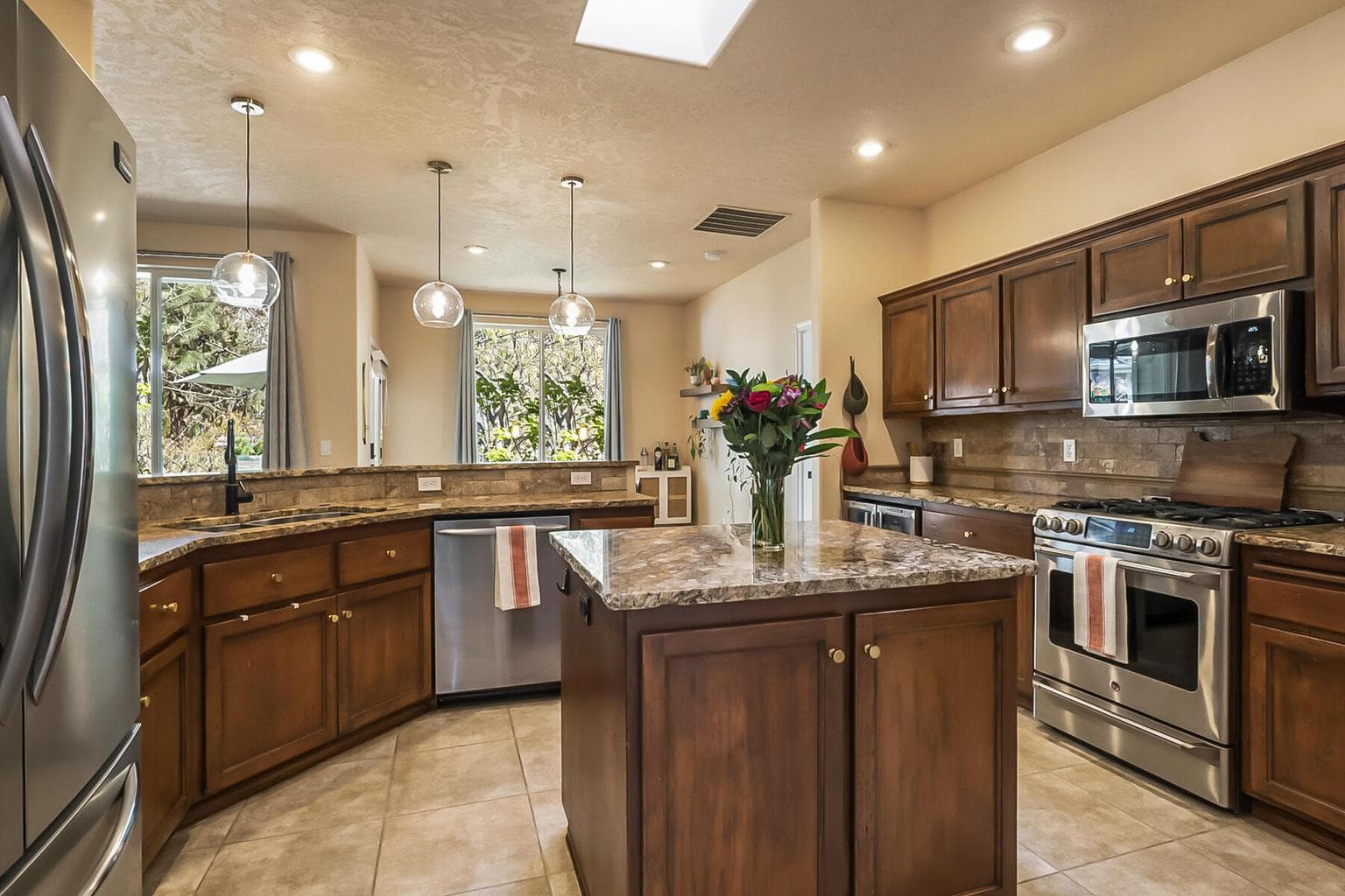Spacious Kitchen with Island, & Stainless Steel Appliances