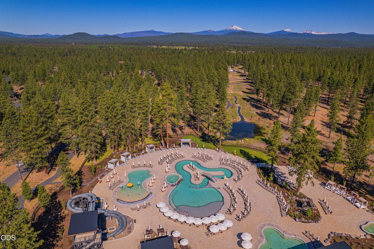 Forest House features multiple pools, a lazy river, children’s splash area, family spa and Piney’s dual-racer waterslide, one of Caldera Springs’ signature owner amenities.