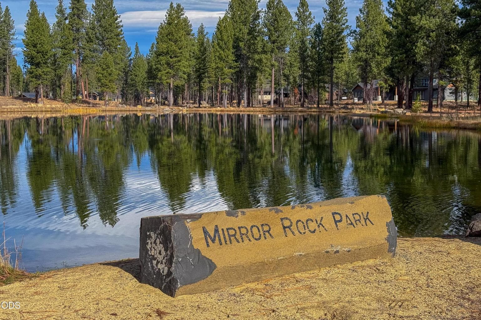 Mirror Rock Park provides a peaceful neighborhood setting along Mirror Lake, surrounded by native landscaping and towering Ponderosa pines.