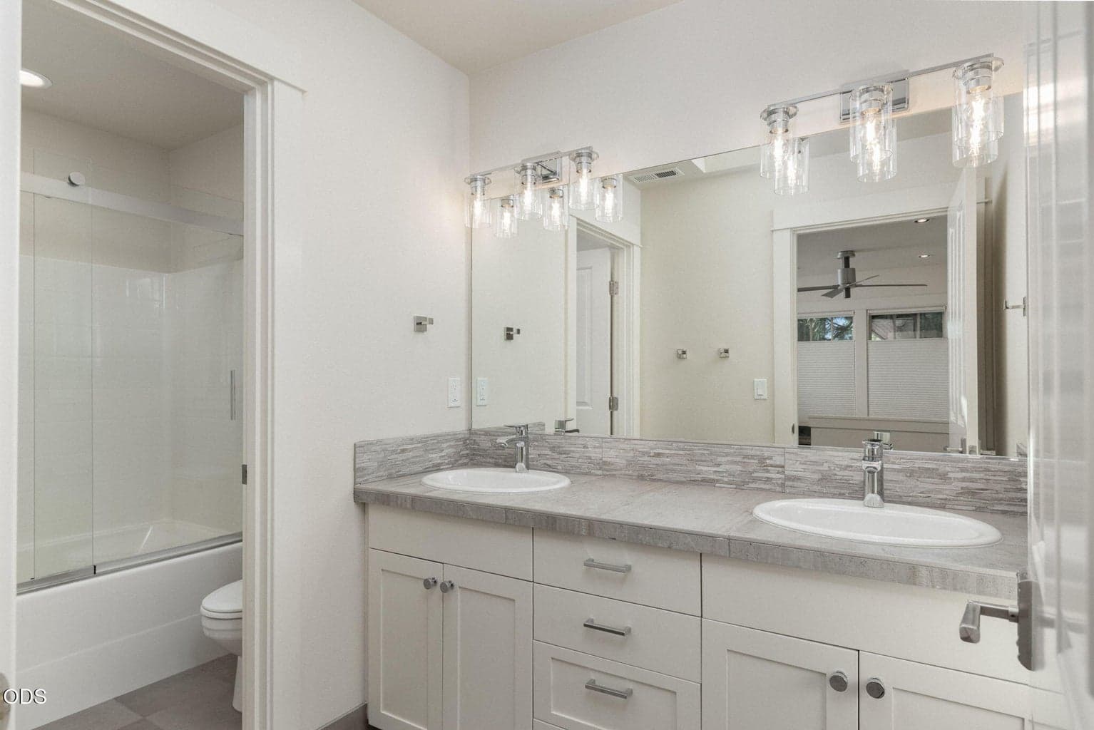 Hall Bath with Double Vanity and Private Shower/Toilet