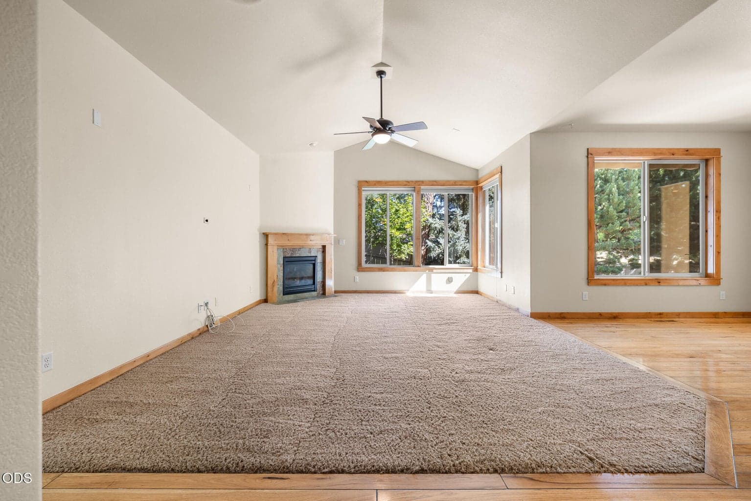 Great room has a cozy gas fireplace