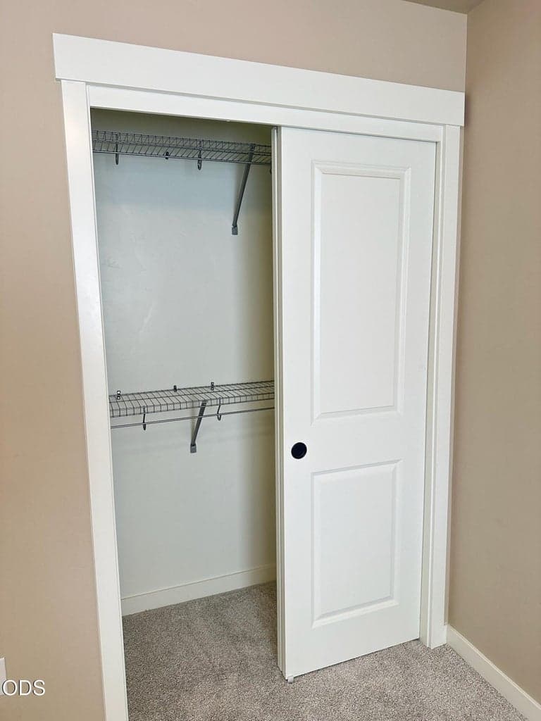 Custom closet-works inside each closet for double hanging or extra stroage.
