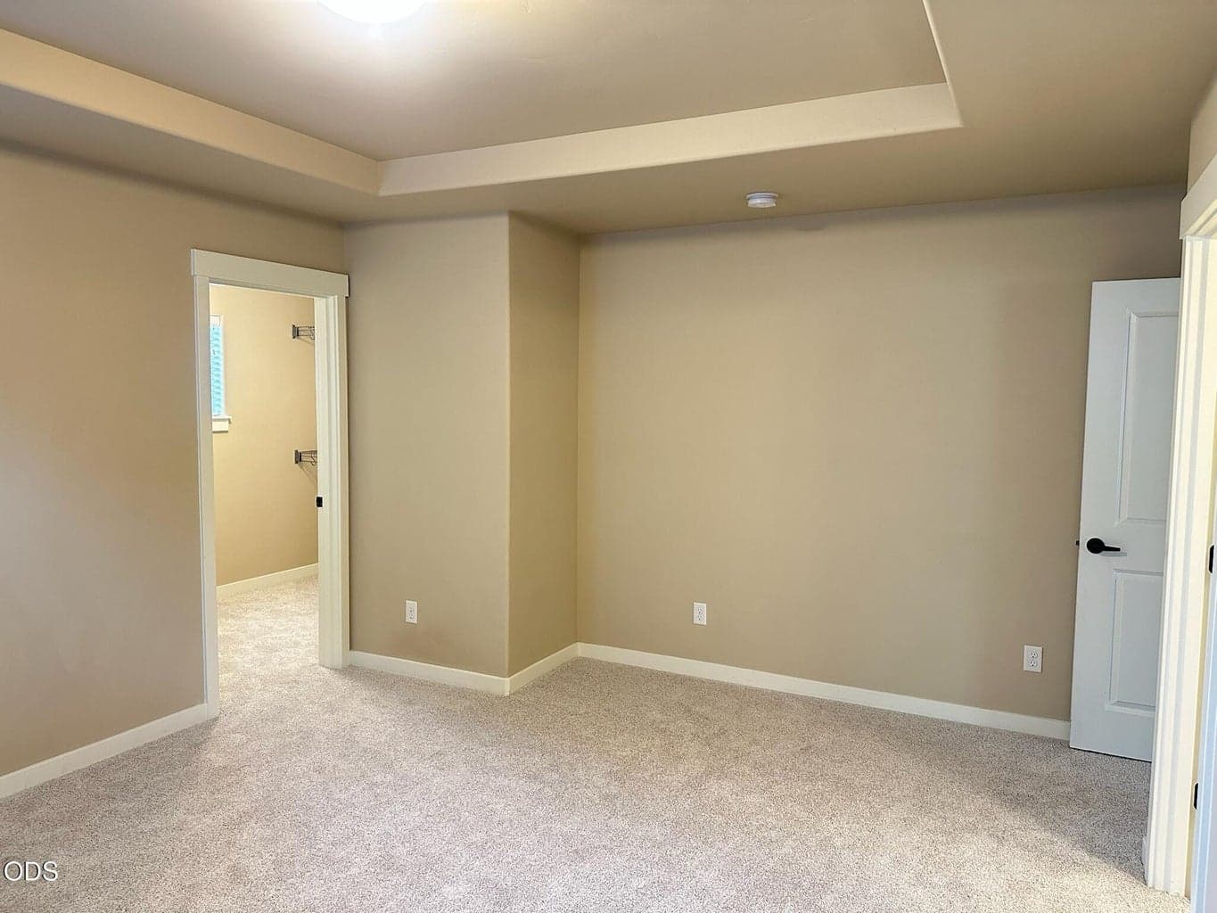 Primary bedroom vacant with new carpeting! Spacious feeling with lots of room for your furnishings.