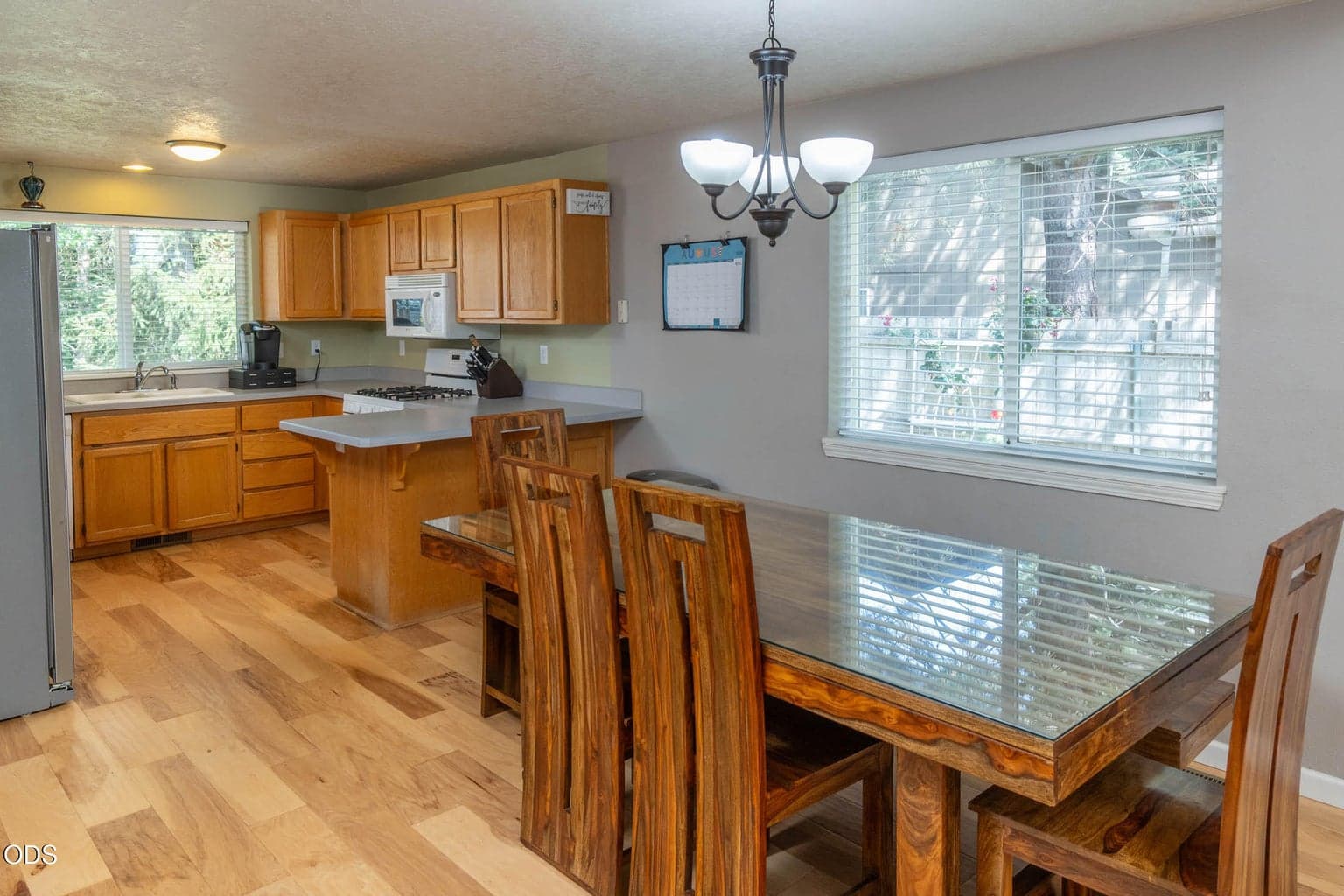 Dining area is beautifully flexible, with room for a hutch, buffet, or cabinet if desired.
