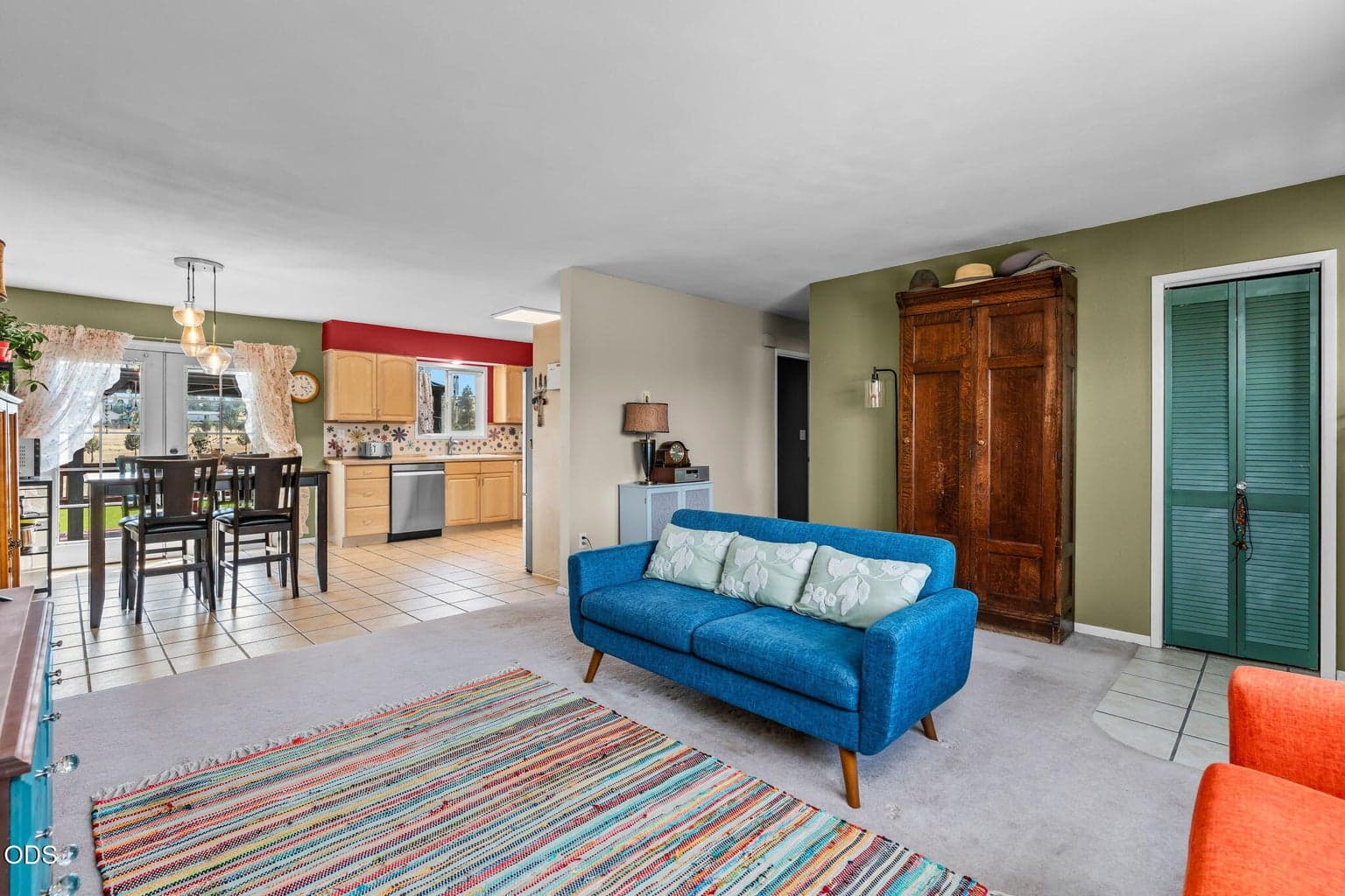 The Living Room opens to the Dining Area