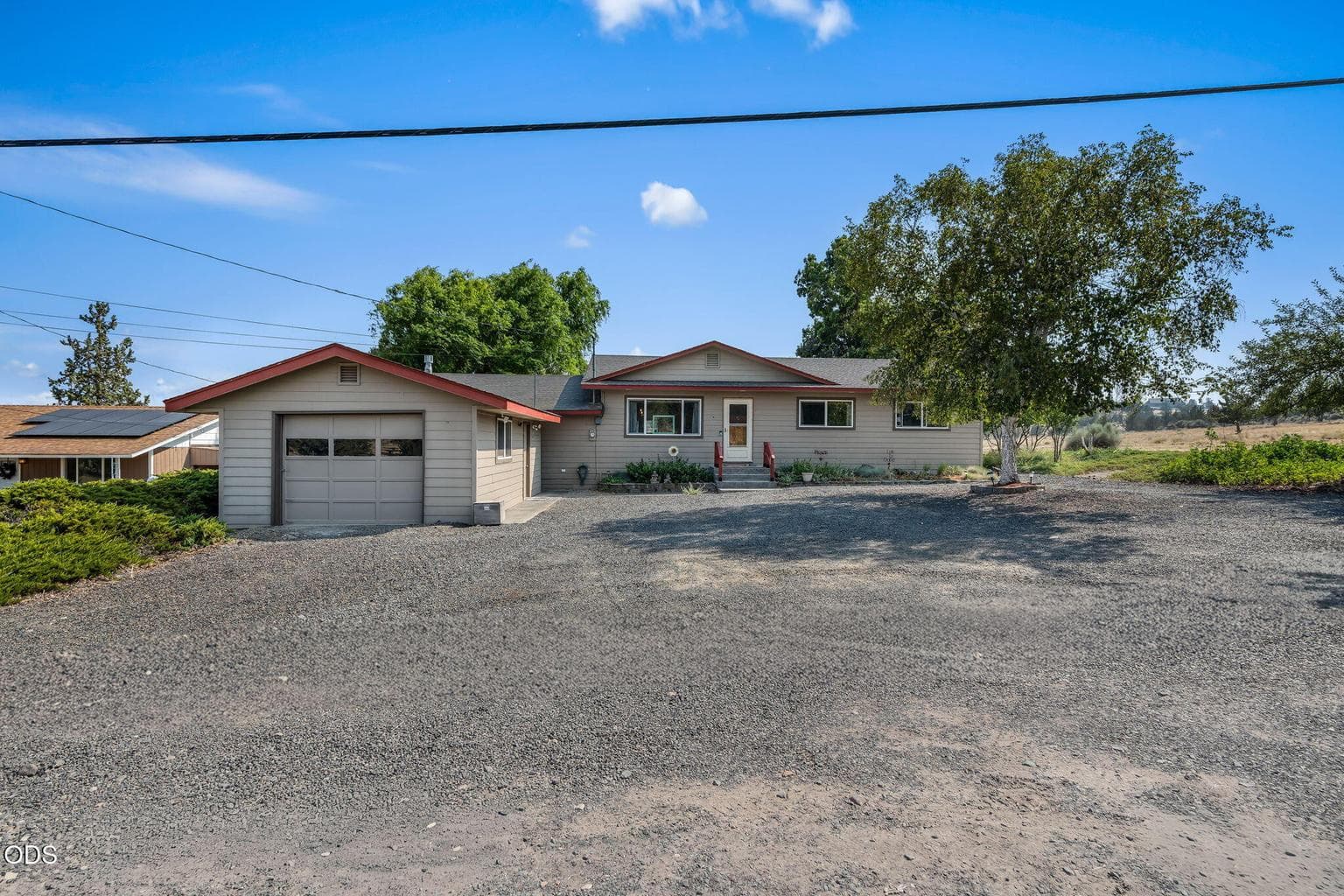 The house sits away from the road with ample room for parking your RV and boat.